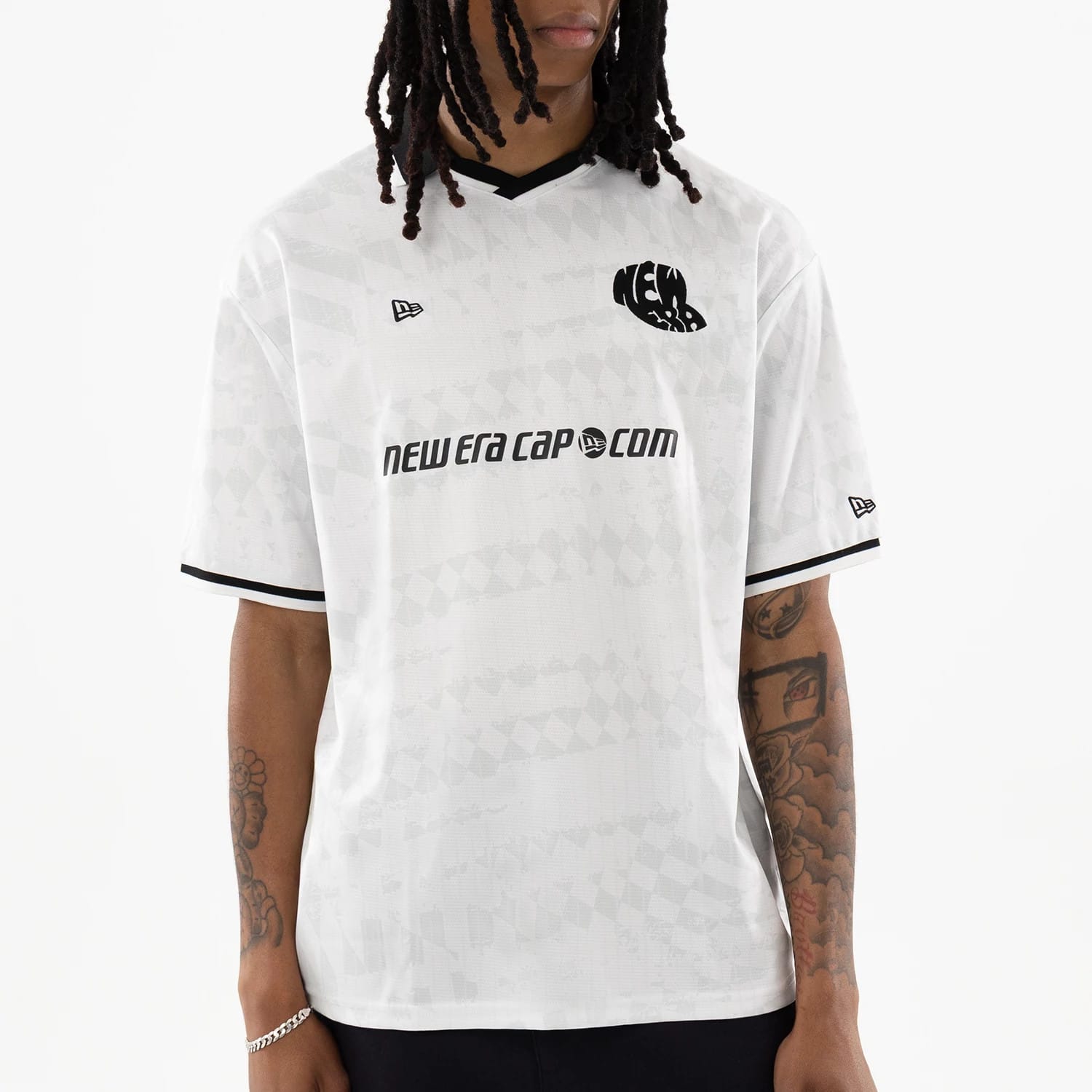 The model is wearing this New Era Soccer Jersey in white. 3