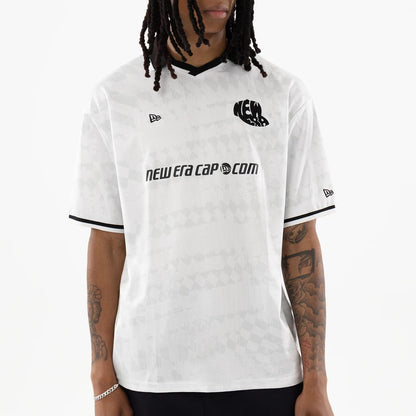 The model is wearing this New Era Soccer Jersey in white. 3