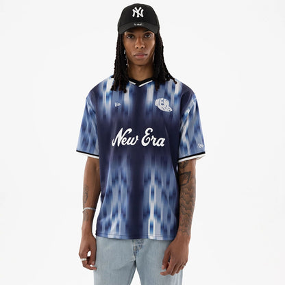 The model is wearing this New Era Soccer Jersey in navy. 1