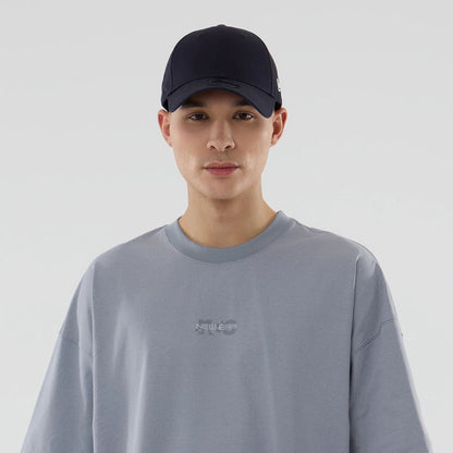 The model is wearing this New Era Urban Core Oversized T-Shirt in grey. 6