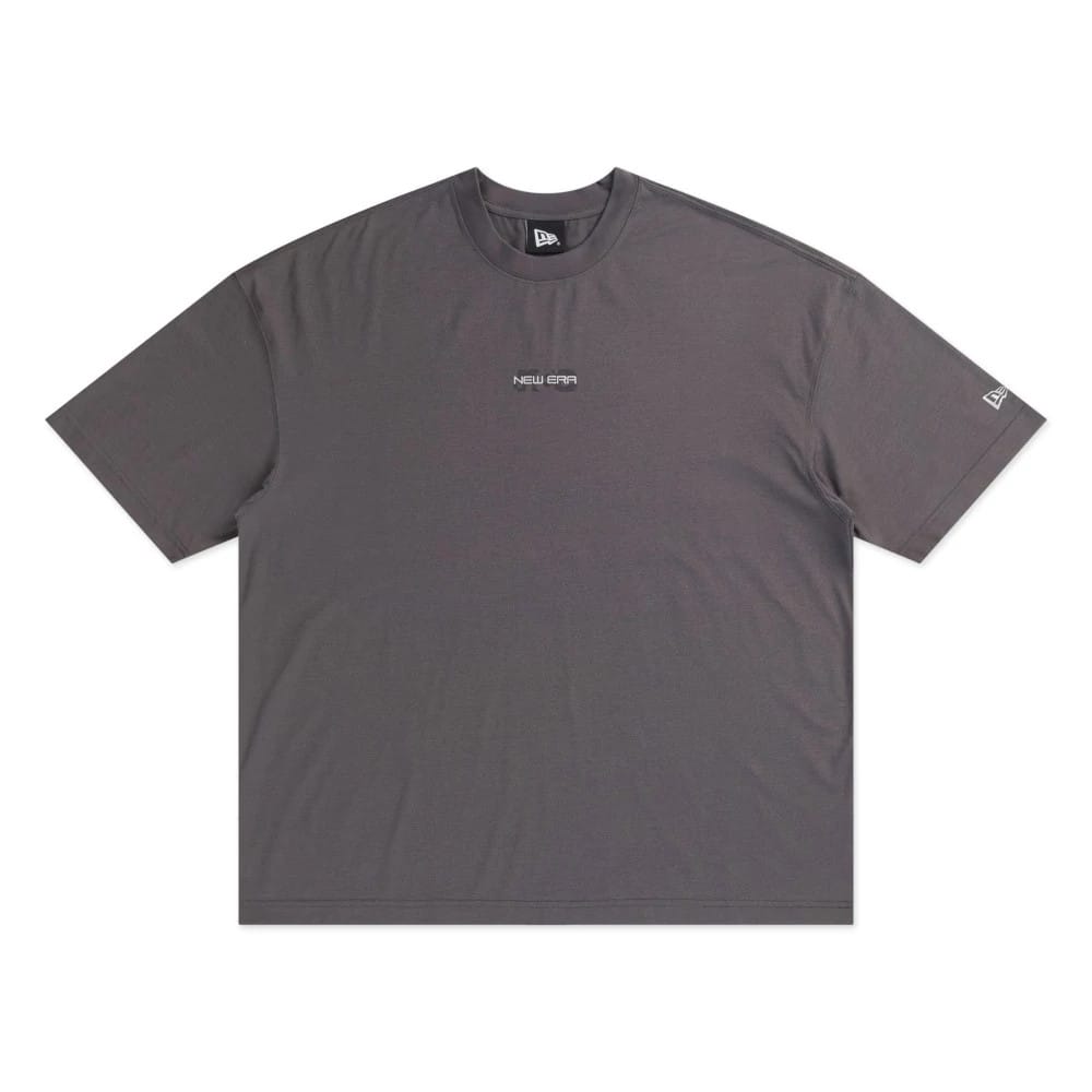 The model is wearing this New Era NEC Logo Oversized T-Shirt in black. 5