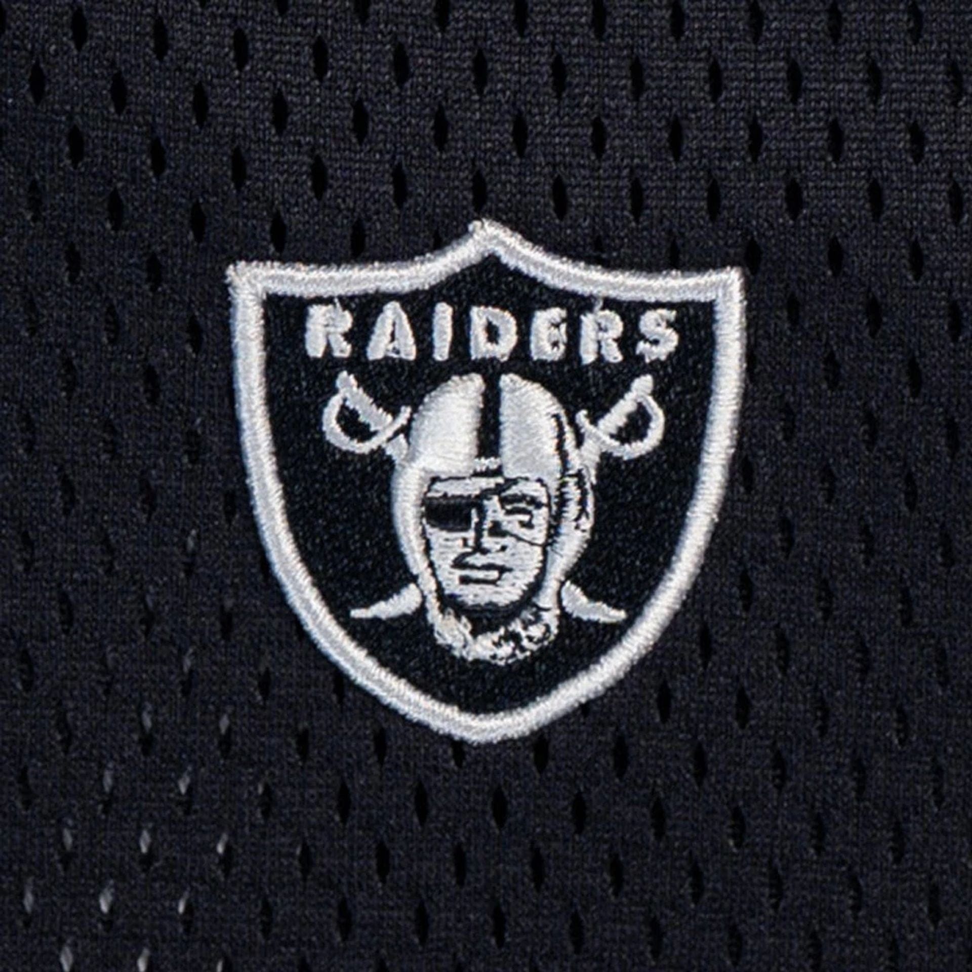 The model is wearing this NFL Mix League Las Vegas Raiders Oversized Mesh T-Shirt in black. 4