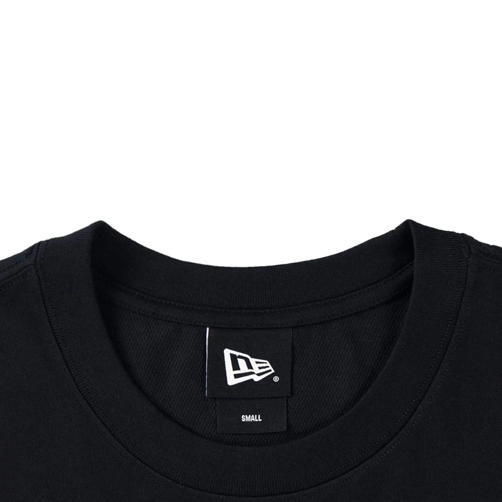 The model is wearing this New Era Skate Is Life Graphic Oversized T-Shirt in black. 4
