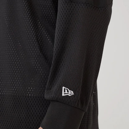 The model is wearing this New Era NEC Logo Long Sleeve Jersey in black. 5
