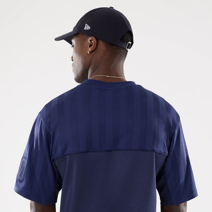 The model is wearing this New Era Street Archived Mesh Jersey in navy. 7