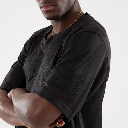 The model is wearing this New Era Street Archived Mesh Jersey in black. 5