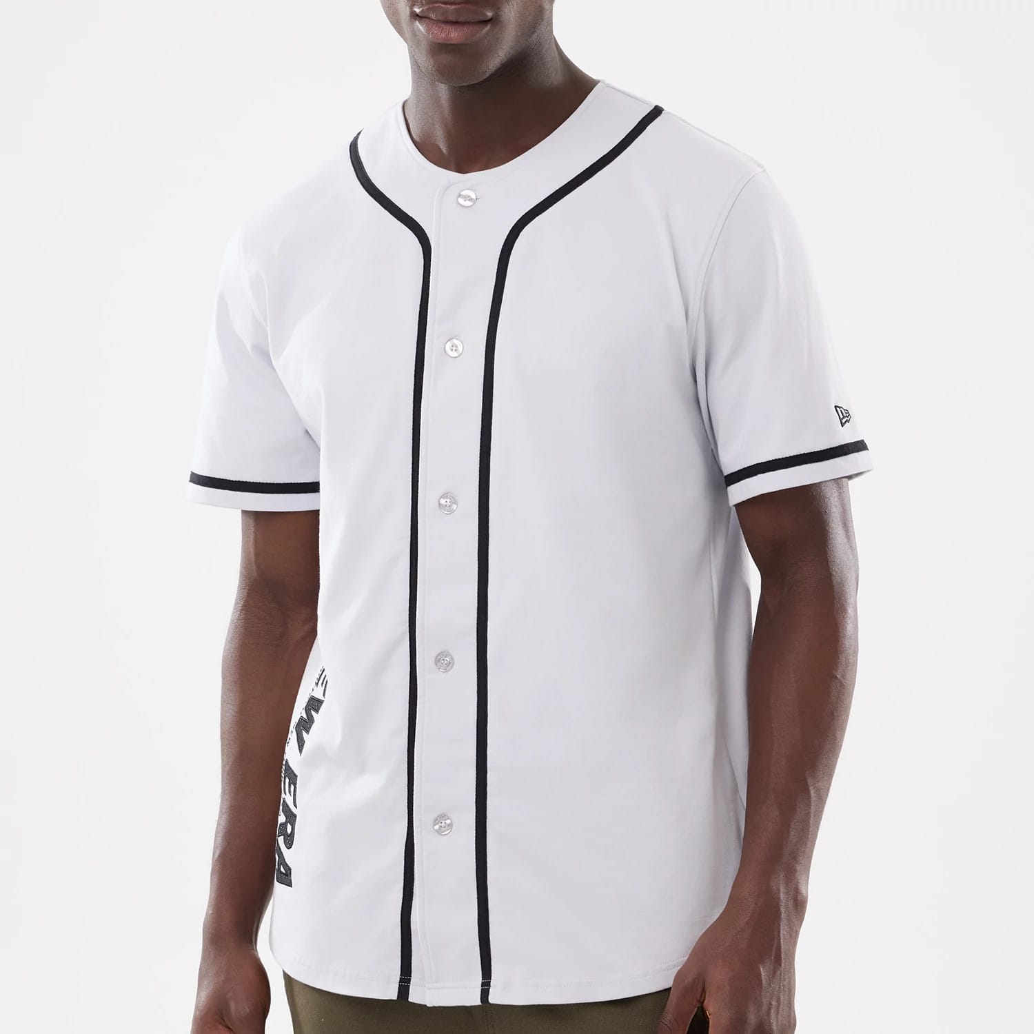 The model is wearing this New Era Basic Jersey in white. 5