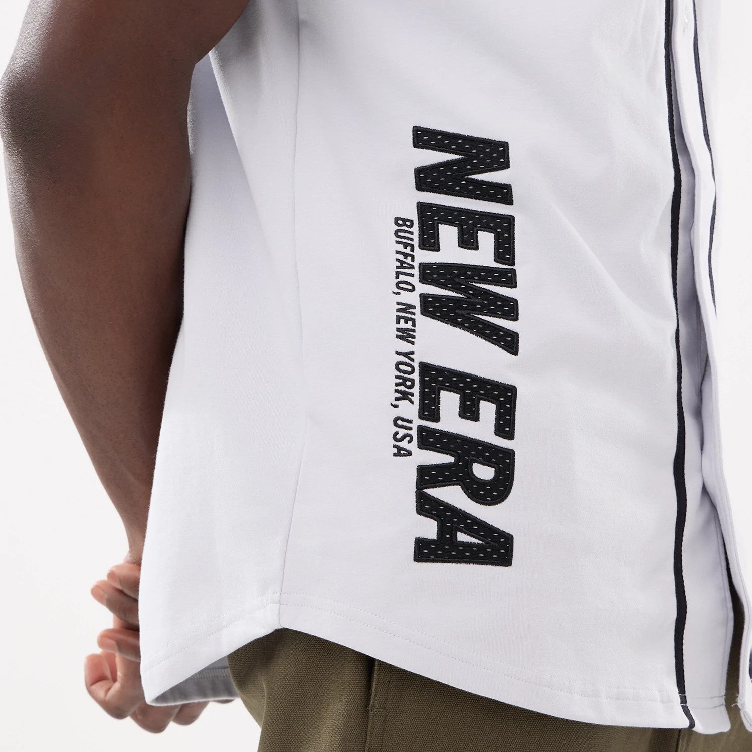 The model is wearing this New Era Basic Jersey in white. 3