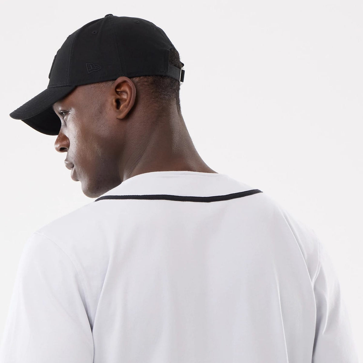 The model is wearing this New Era Basic Jersey in white. 6