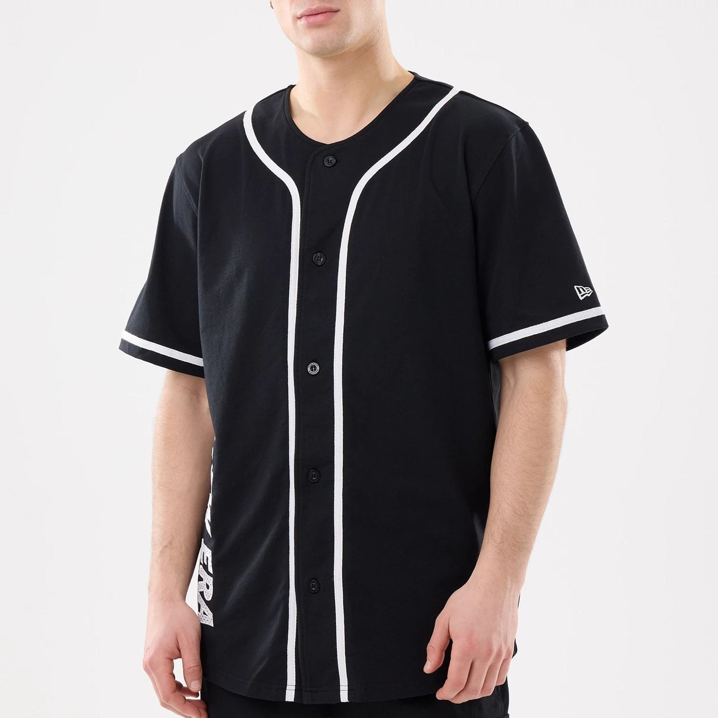 The model is wearing this New Era Basic Jersey in black. 5