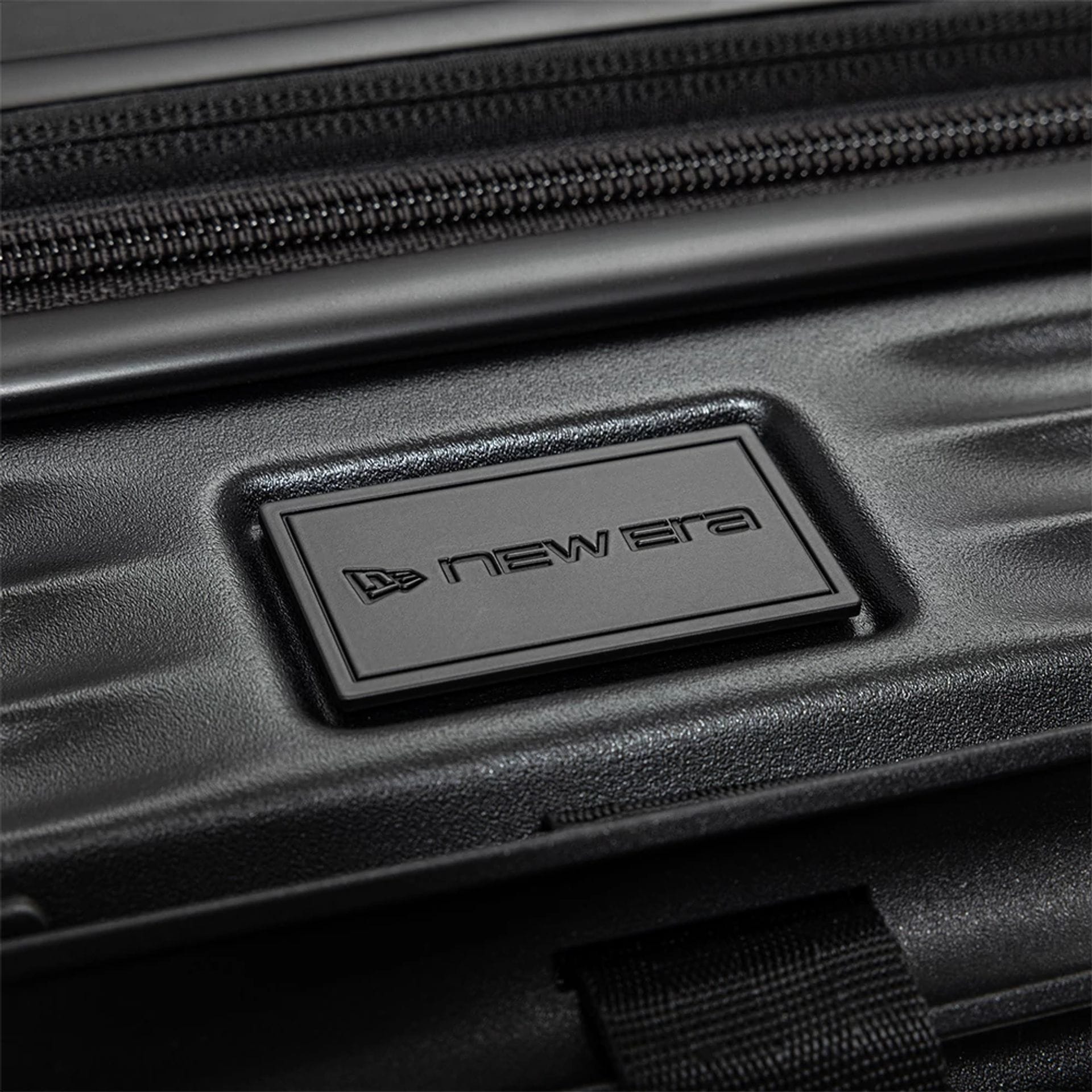 Pictured is this New Era Wheeled Cabin Case in black. 12