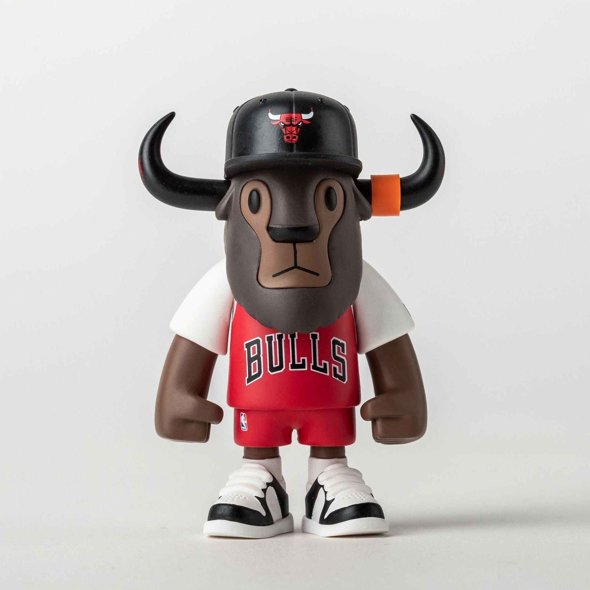 Pictured is this NBA 2025 Chicago Bulls Mini Buffalo Figure in dark red. 1