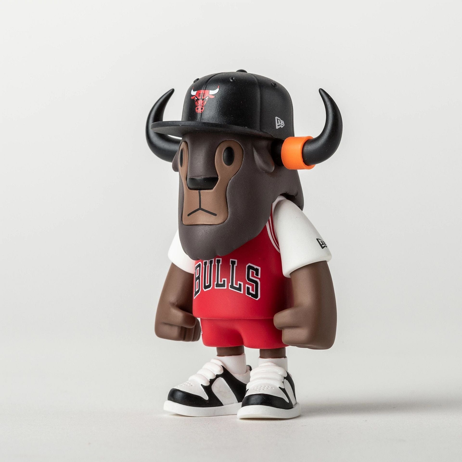 Pictured is this NBA 2025 Chicago Bulls Mini Buffalo Figure in dark red. 2