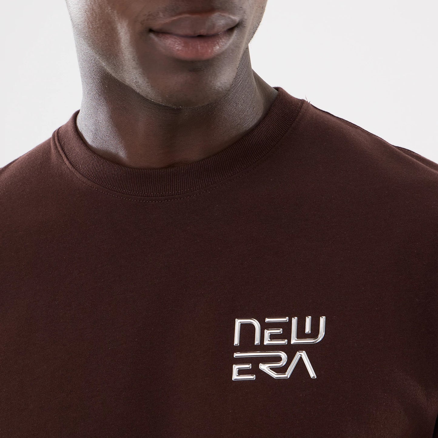 The model is wearing this Hajime Sorayama X MLB San Diego Padres T-Shirt in Dark Brown. 3