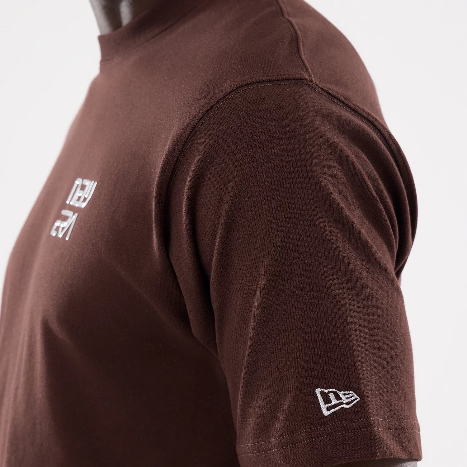 The model is wearing this Hajime Sorayama X MLB San Diego Padres T-Shirt in Dark Brown. 5