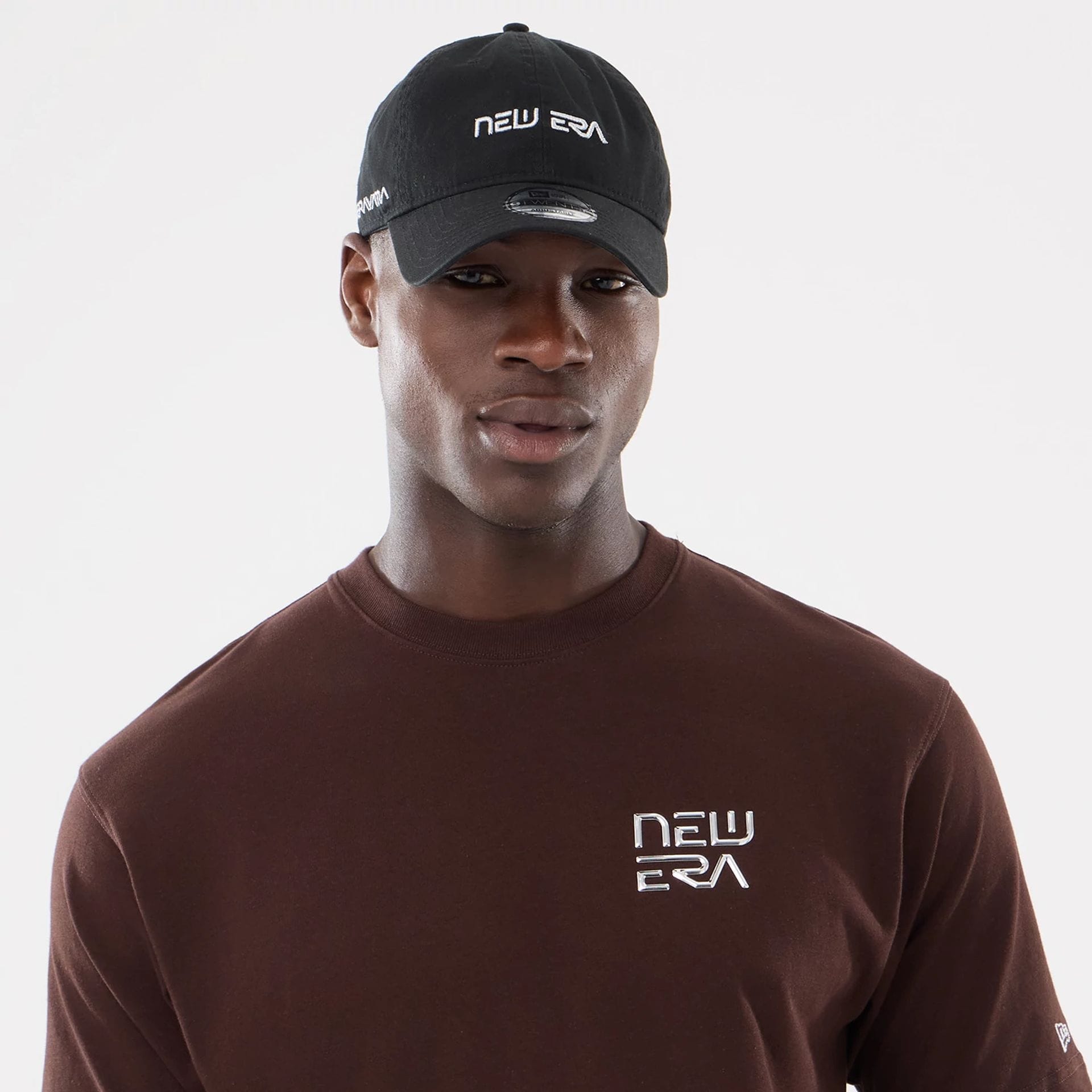 The model is wearing this Hajime Sorayama X MLB San Diego Padres T-Shirt in Dark Brown. 7