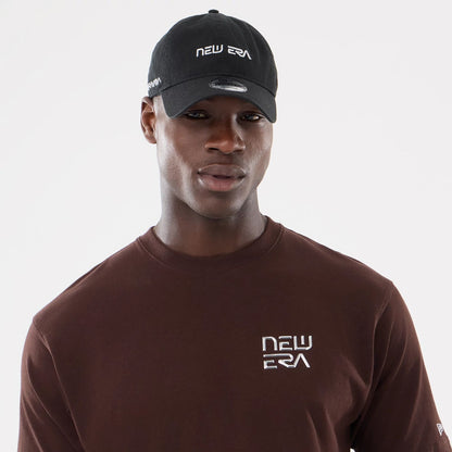 The model is wearing this Hajime Sorayama X MLB San Diego Padres T-Shirt in Dark Brown. 7