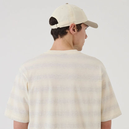 The model is wearing this MLB Border LA Dodgers Oversized T-Shirt in cream. 7