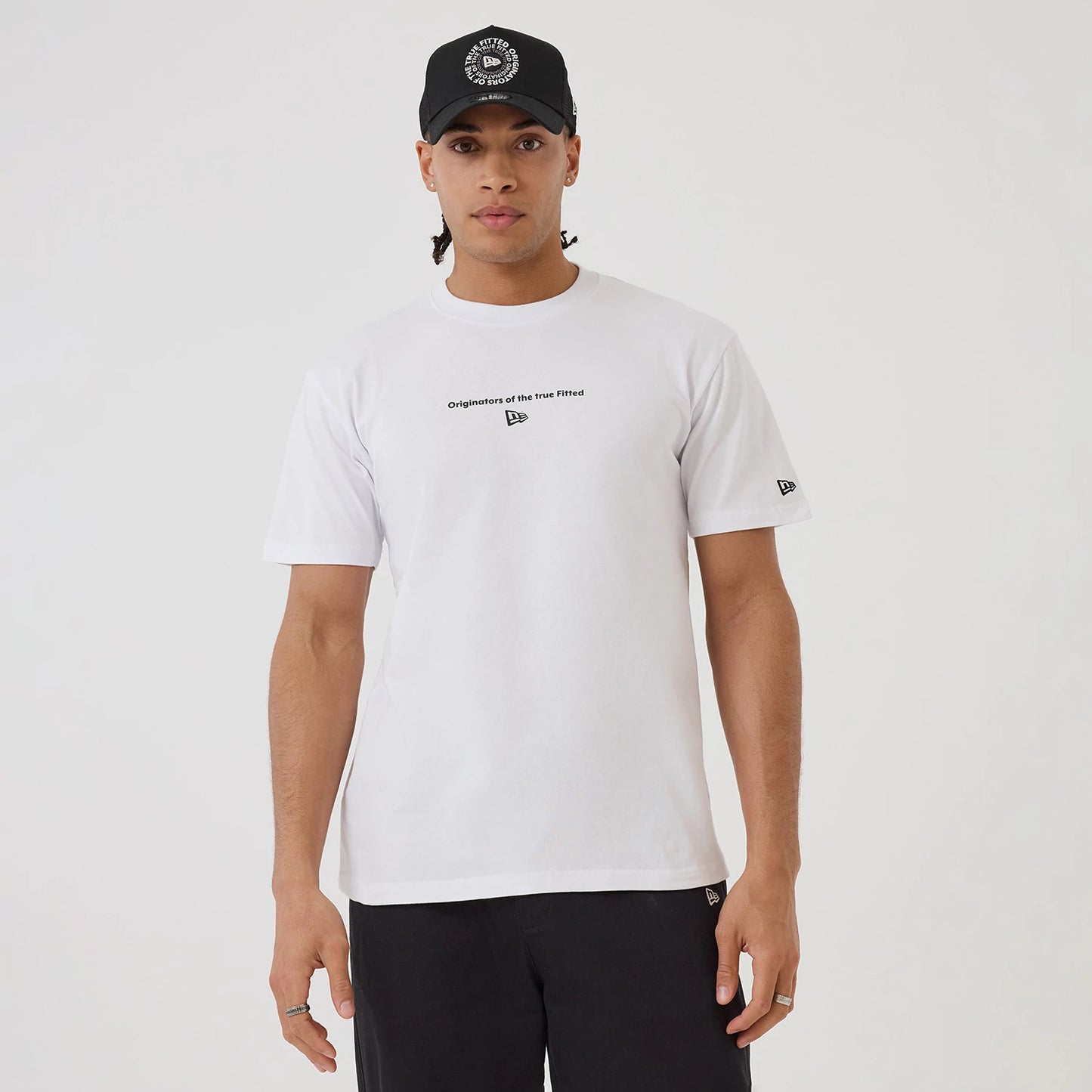 The model is wearing this New Era Circle T-Shirt in white. 1
