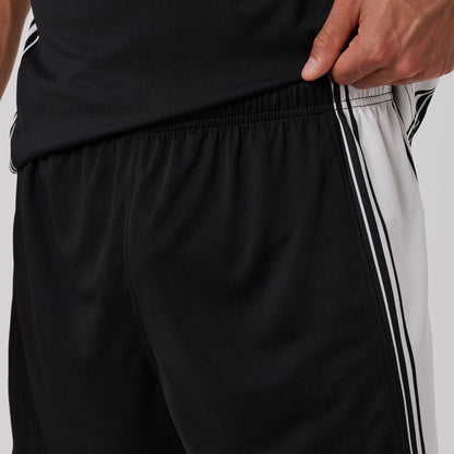 The model is wearing this New Era Mesh Oversized Shorts in black. 6
