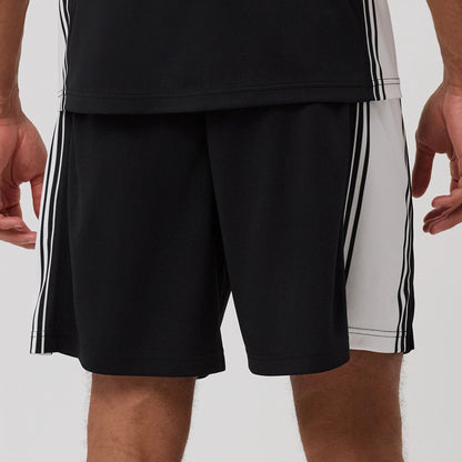 The model is wearing this New Era Mesh Oversized Shorts in black. 5