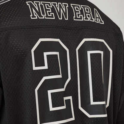 New Era Mesh Football Black Short Sleeve Shirt, back view showing white embroidered "NEW ERA" lettering across the shoulder and large white outlined number 20 printed at the centre of the black mesh fabric.