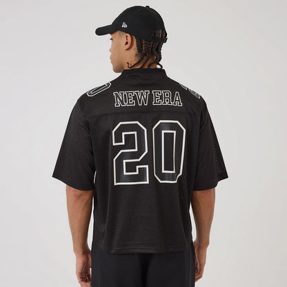 New Era Mesh Football Black Short Sleeve Shirt, back view on a model with a black cap, featuring large white outlined number 20 and New Era lettering across the shoulders on a textured mesh fabric.