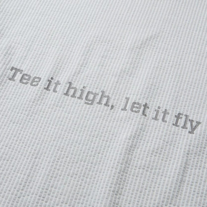 The model is wearing this New Era Seersucker Polo T-Shirt in grey. 8