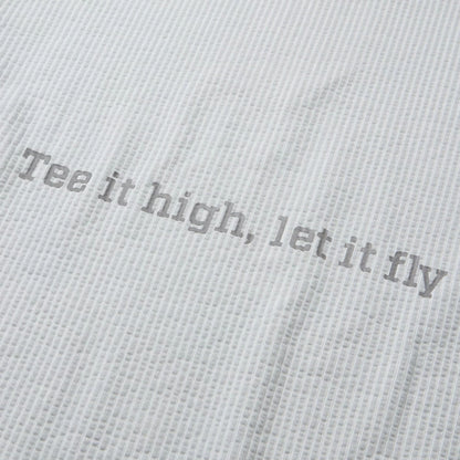 The model is wearing this New Era Seersucker Polo T-Shirt in grey. 8