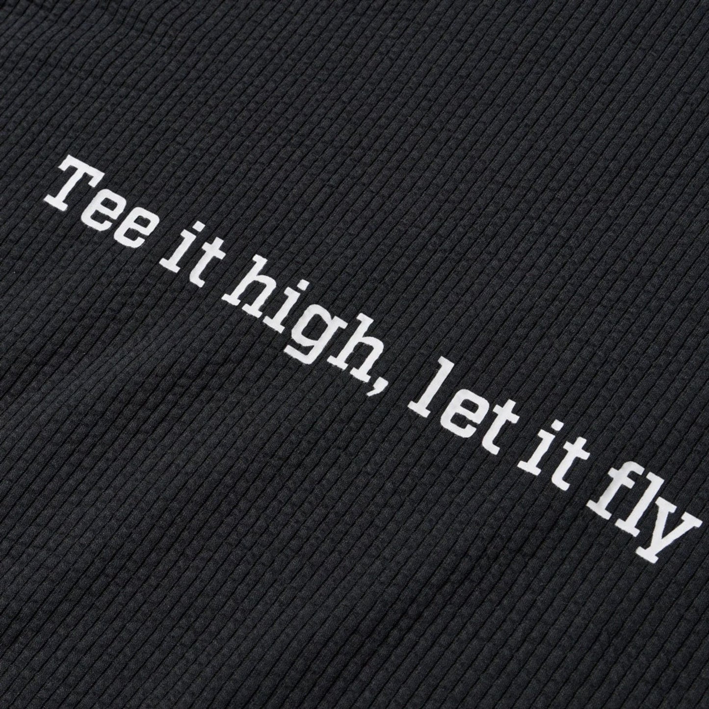 The model is wearing this New Era Seersucker Polo T-Shirt in black. 8