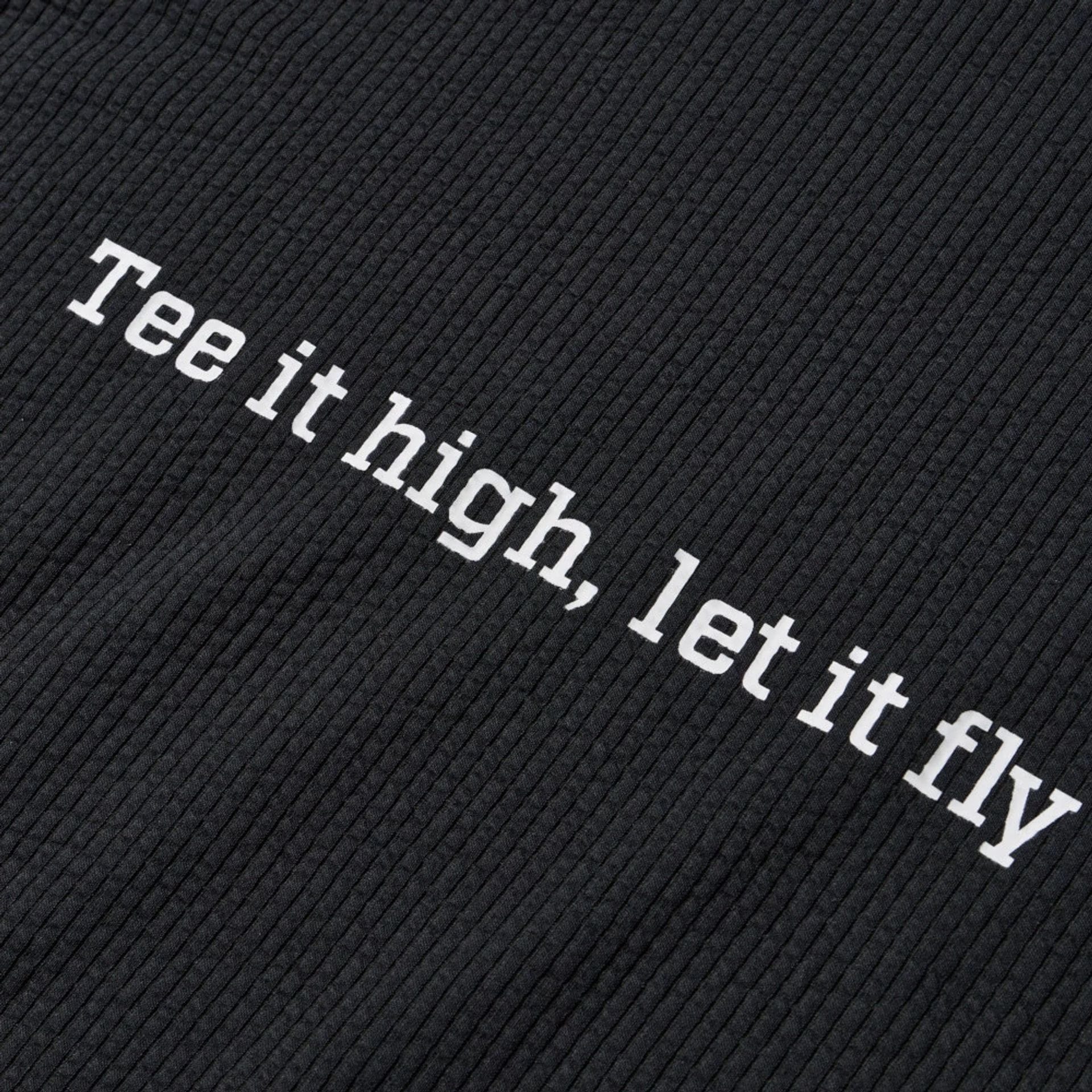 The model is wearing this New Era Seersucker Polo T-Shirt in black. 8