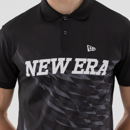 The model is wearing this New Era Grid Polo T-Shirt in black. 4