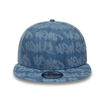 Pictured is this New Era Laser Burnout Washed Denim 9FIFTY Snapback Adjustable cap in navy. 3