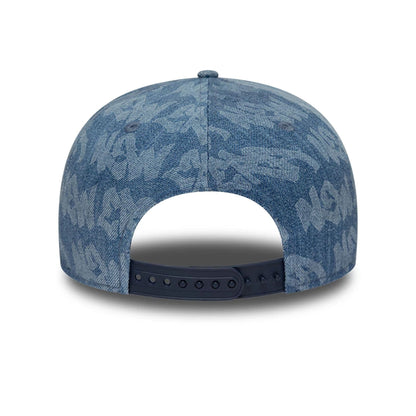 Pictured is this New Era Laser Burnout Washed Denim 9FIFTY Snapback Adjustable cap in navy. 7