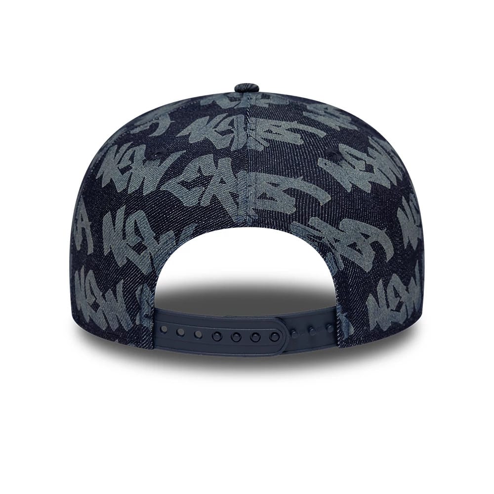 Pictured is this New Era Laser Burnout Denim 9FIFTY Snapback Adjustable cap in navy. 6