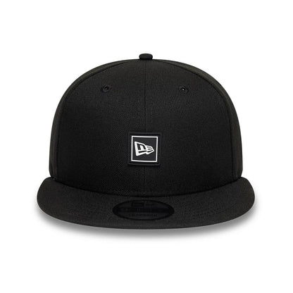 Pictured is this New Era Flag Patch 9FIFTY Snapback cap in black. 2