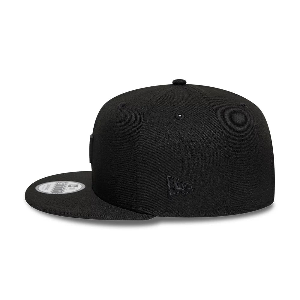 Pictured is this New Era Flag Patch 9FIFTY Snapback cap in black. 6