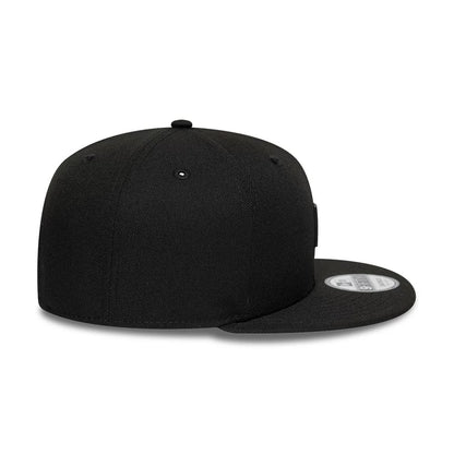 Pictured is this New Era Flag Patch 9FIFTY Snapback cap in black. 7