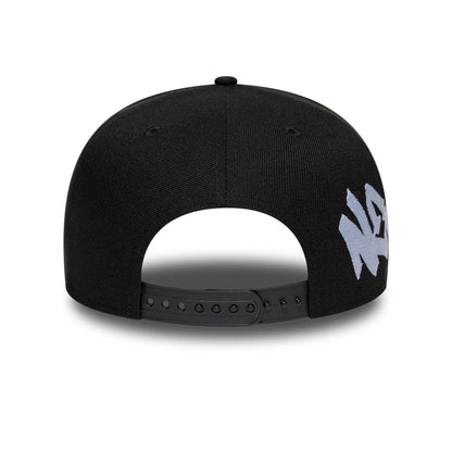 Pictured is this New Era Essential Tagging 9FIFTY Snapback cap in black. 5