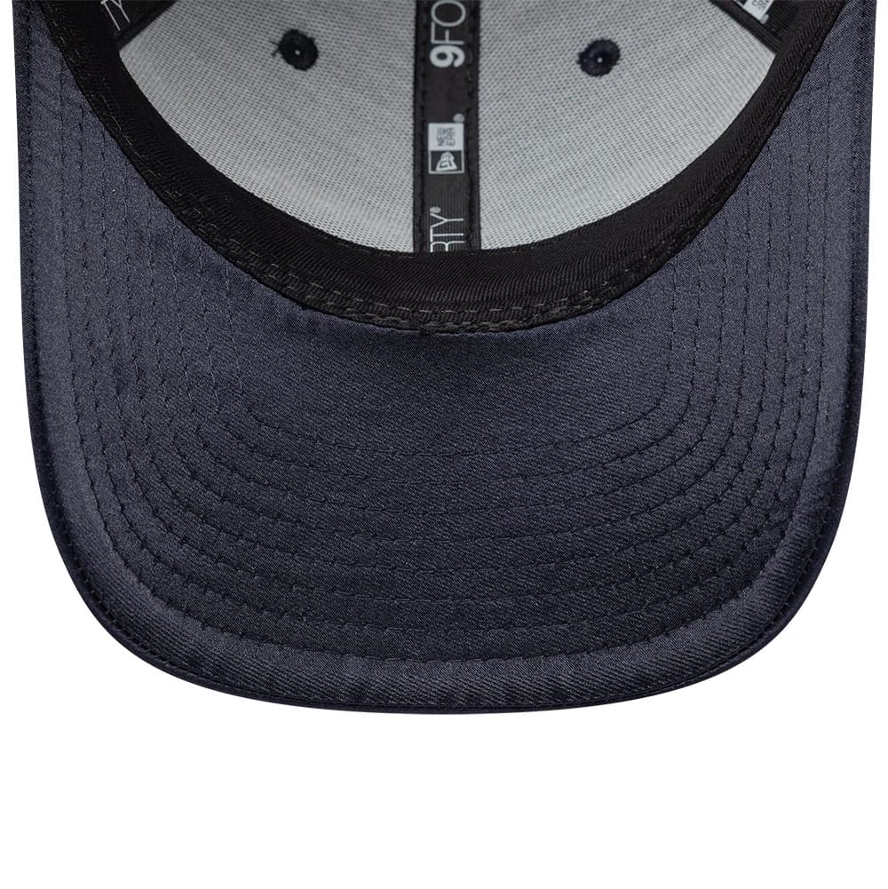 Pictured is this New Era Satin 9FORTY cap in navy. 5