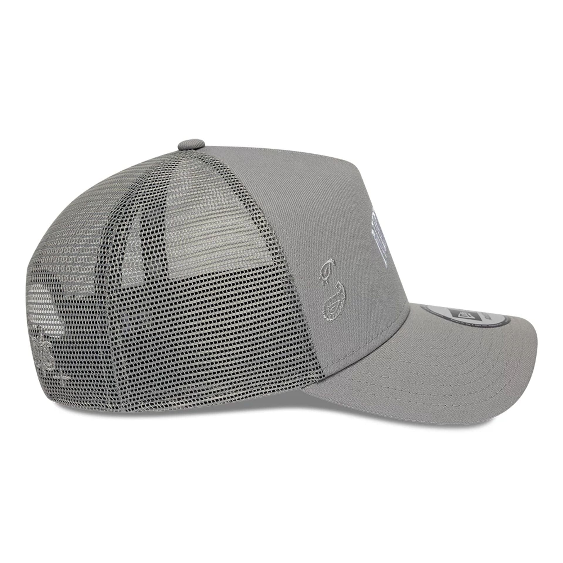 Pictured is this New Era Paisley Emblem 9FORTY A-Frame Trucker cap in grey. 5