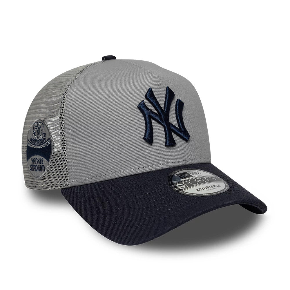 Pictured is this MLB Patch New York Yankees 9FORTY A-Frame Trucker cap in grey & navy. 1