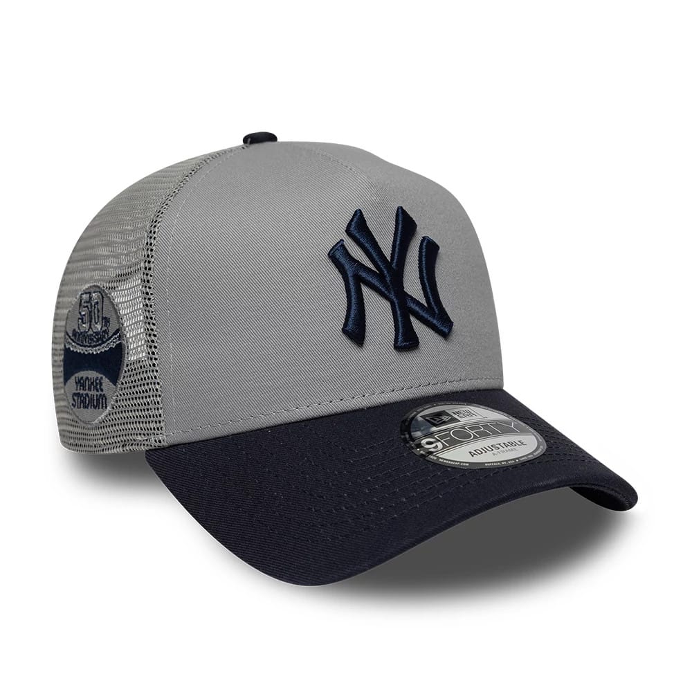 Pictured is this MLB Patch New York Yankees 9FORTY A-Frame Trucker cap in grey & navy. 1