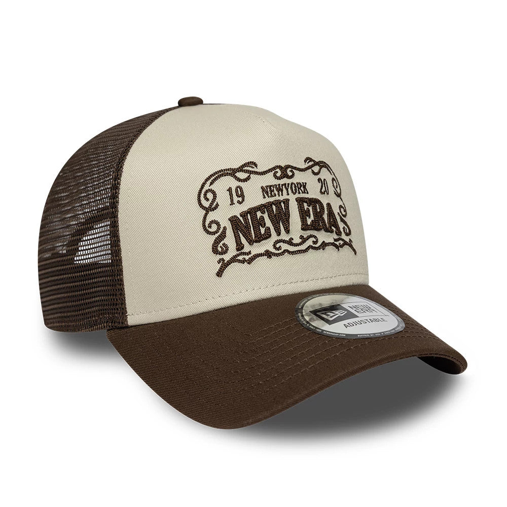 Pictured is this New Era Frame Logo 9FORTY A-Frame Trucker cap in Dark Brown. 3