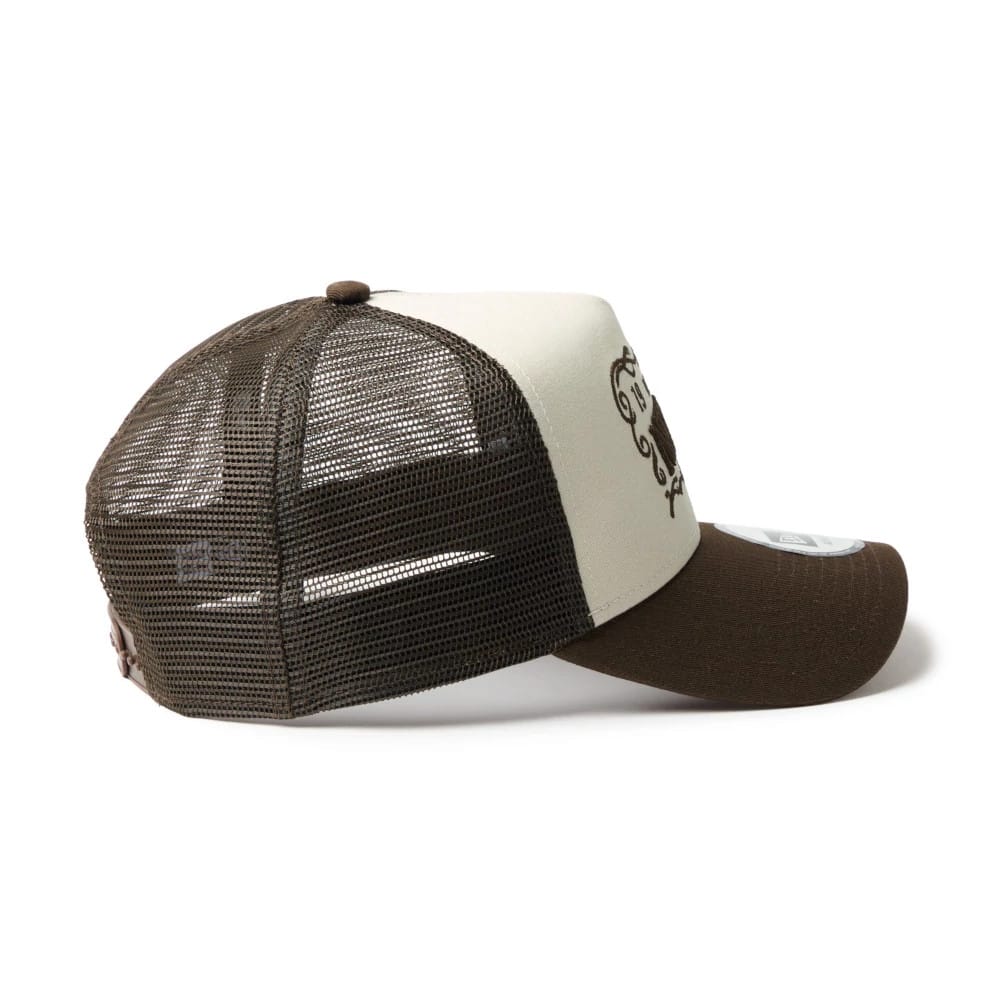 Pictured is this New Era Frame Logo 9FORTY A-Frame Trucker cap in Dark Brown. 6