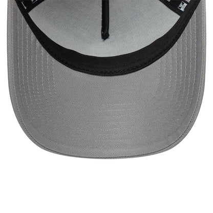 Pictured is this New Era Script 9FORTY A-Frame Trucker cap in grey. 7