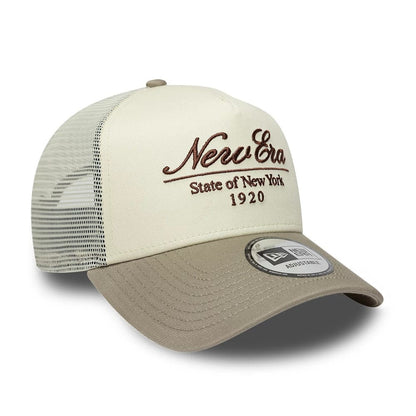 Pictured is this New Era Script 9FORTY A-Frame Trucker cap in cream. 3