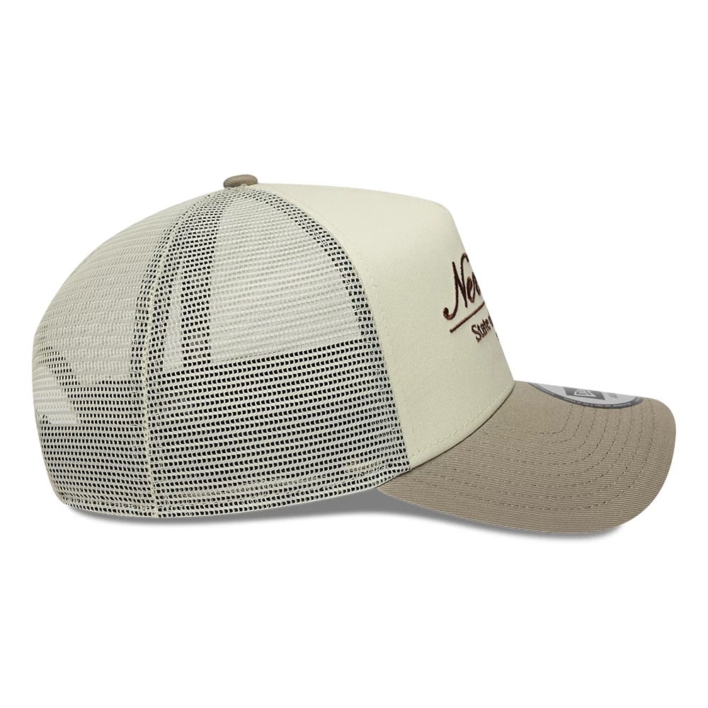 Pictured is this New Era Script 9FORTY A-Frame Trucker cap in cream. 5