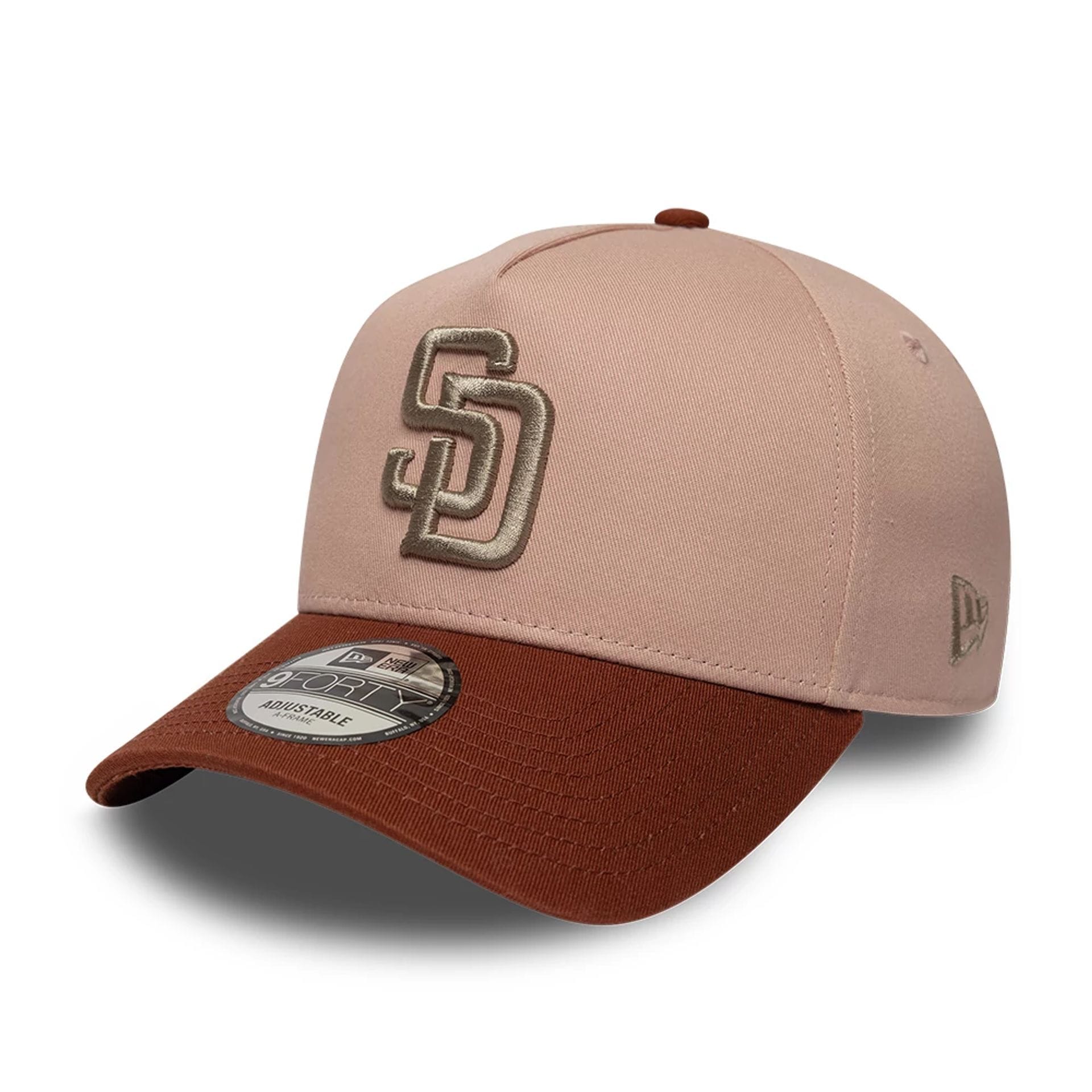 Pictured is this MLB Mocha Mousse San Diego Padres 9FORTY A-Frame Adjustable cap in pastel pink. 1
