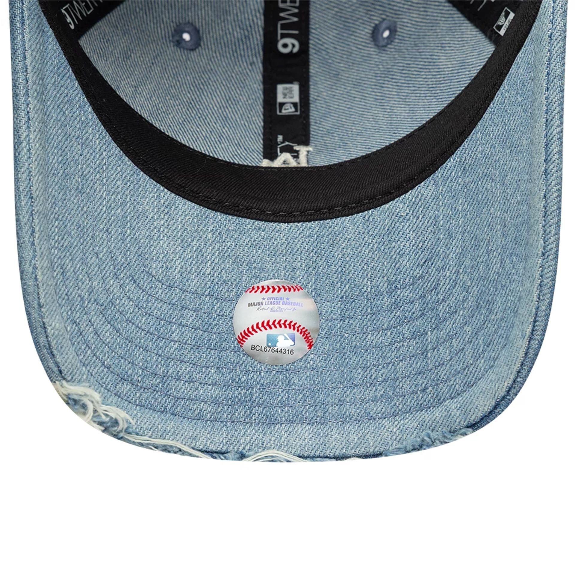 Pictured is this MLB Distressed Washed Denim LA Dodgers 9TWENTY cap in blue. 7